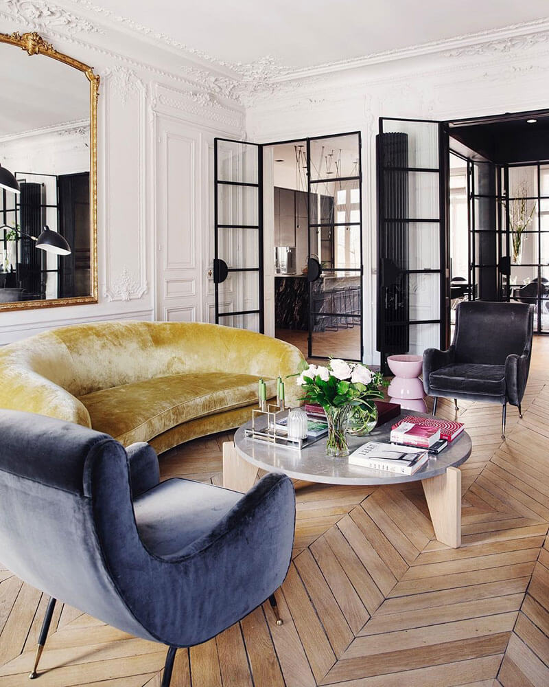 How To Style Your Home Like A Parisian Apartment 8 paris-living-room-yellow-sofa-steel-doors-nordroom