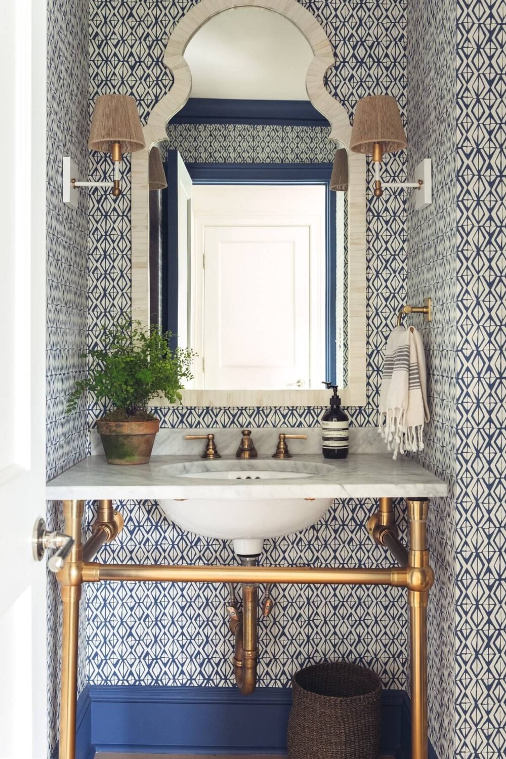 Valspar Color of the Year 2025: Encore 17 powder-room-blue-wallpaper-brass-fixtures-nordroom