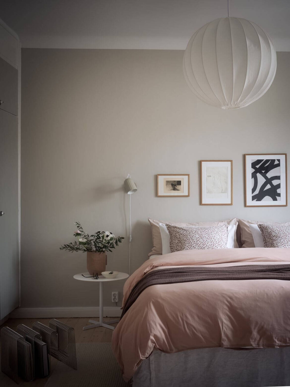 Best of 2021: Bedrooms 19 serene-scandinavian-bedroom-pink-accents-nordroom