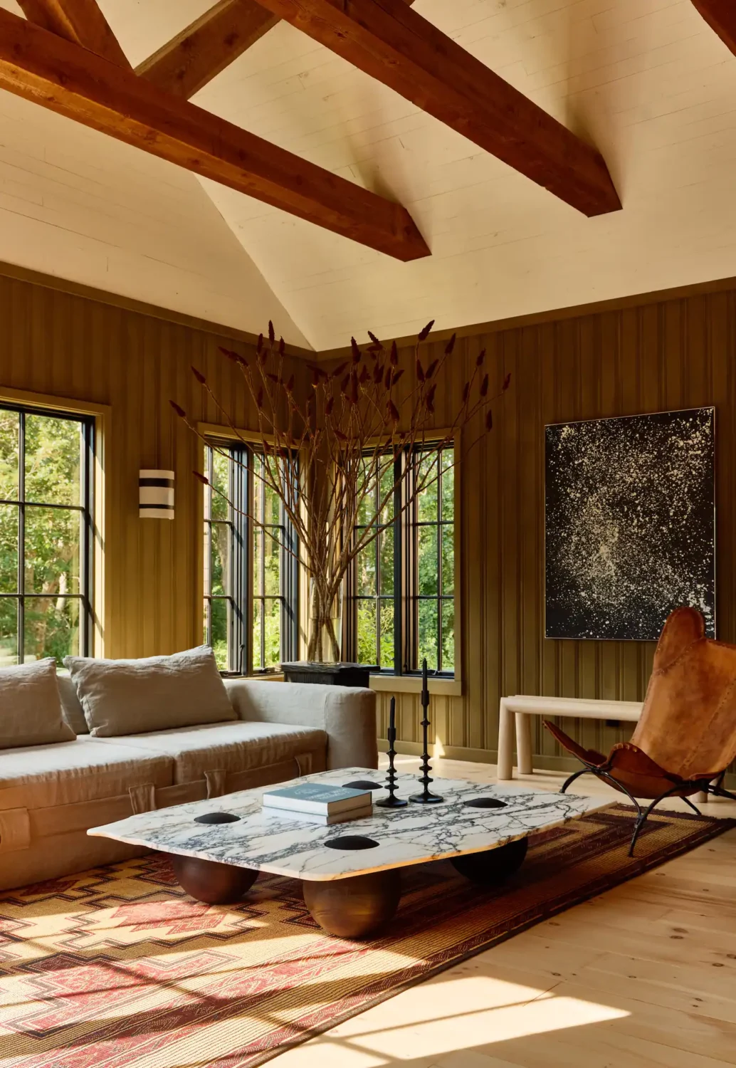 A Montauk Airbnb Designed by Robert McKinley 6 wood-panelled-sitting-room-exposed-beams-airbnb-nordroom