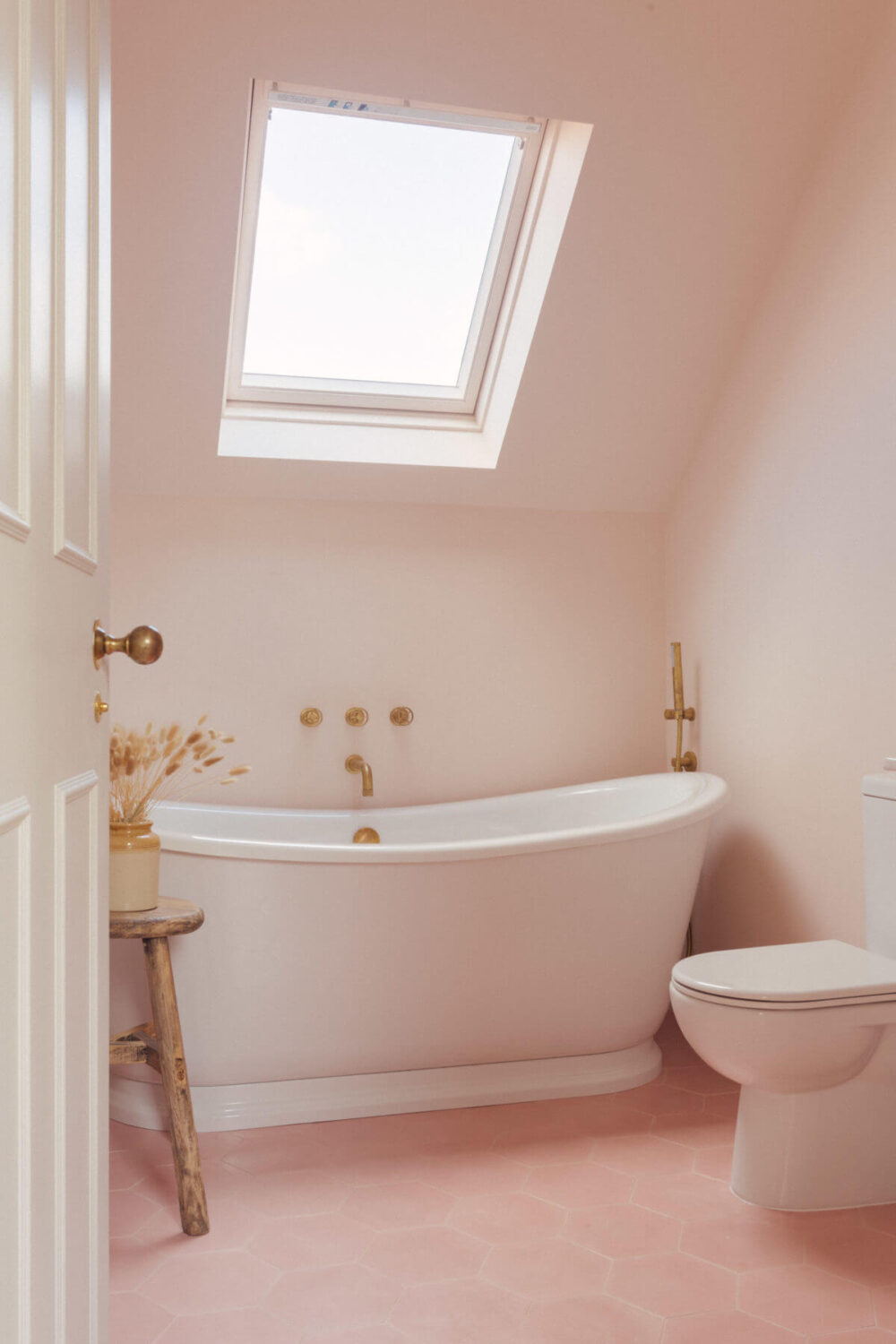 A Light-Filled Victorian Family Home in London 33 attic-bathroom-freestanding-bath-pink-floor-tiles-family-home-london-nordroom