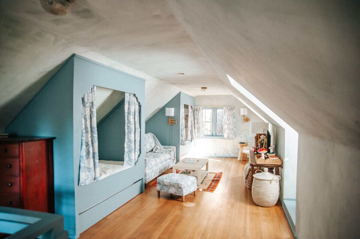An Interior Designer's Colorful Airbnb Cabin 17 attic-bedroom-bed-nook-airbnb-cabin-nordroom