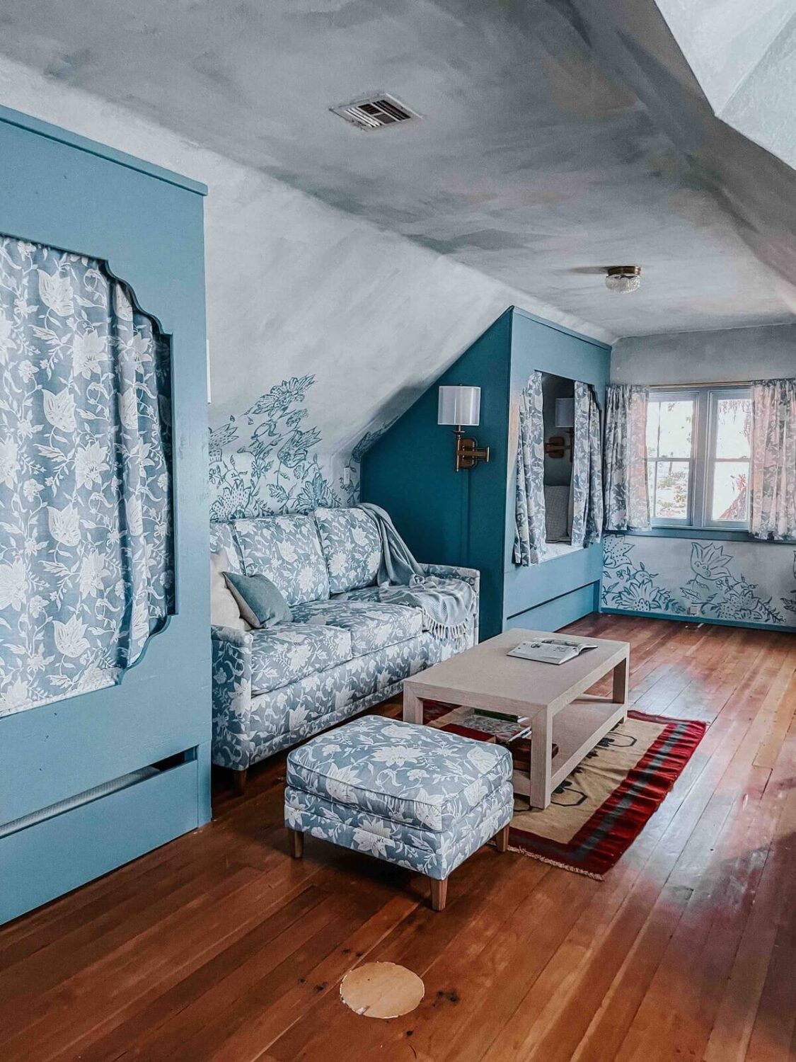 An Interior Designer's Colorful Airbnb Cabin 19 bed-nook-blue-bedroom-airbnb-cabin-nordroom