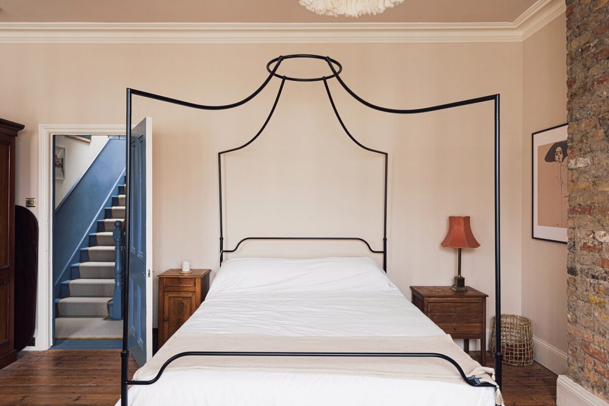 An Elegant & Colorful London House 12 bedroom-canopy-bed-brick-wall-nordroom