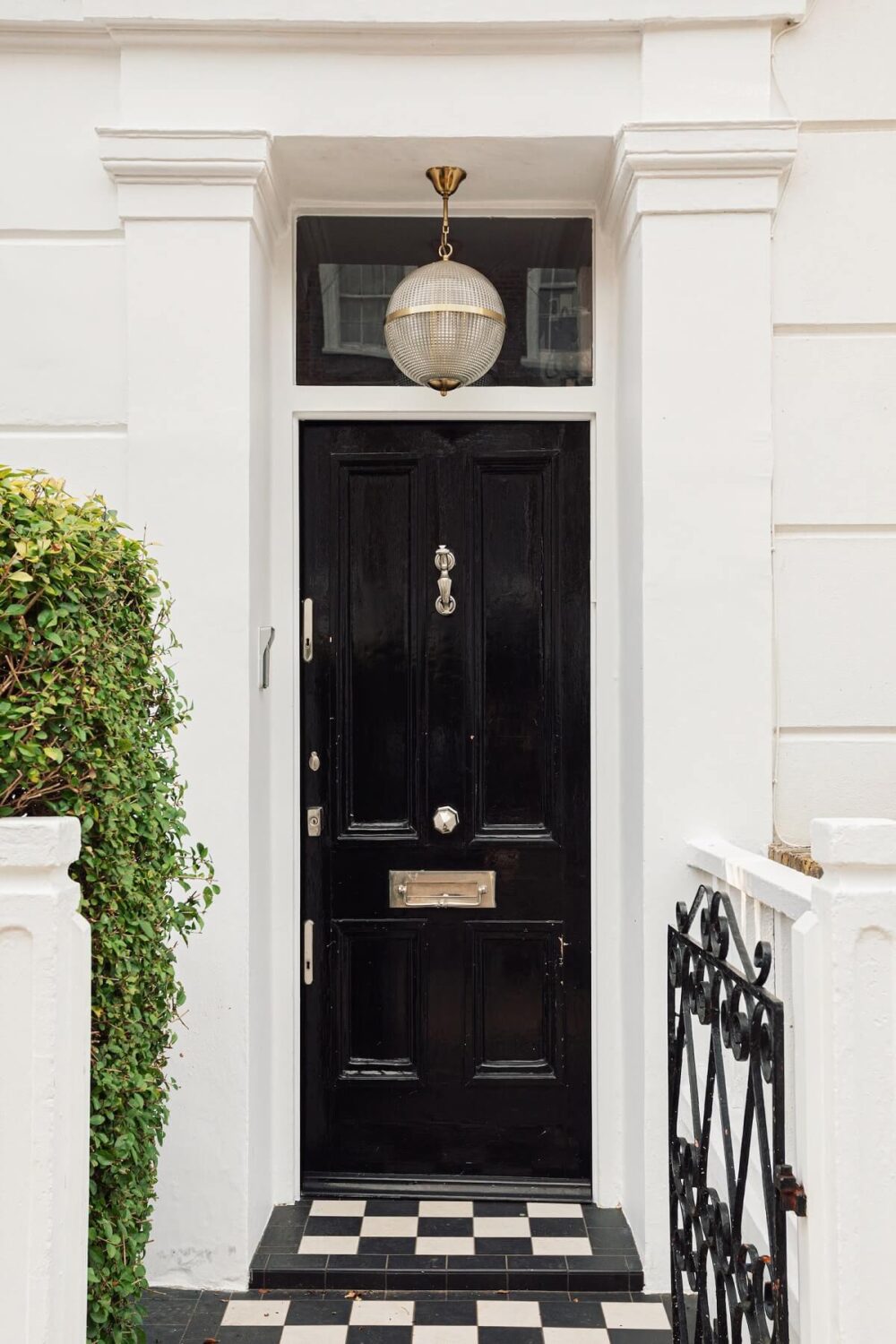Boost Your Home's Value by Thousands with This Simple Paint Trick! 24 black-doorway-victorian-home-london-nordroom