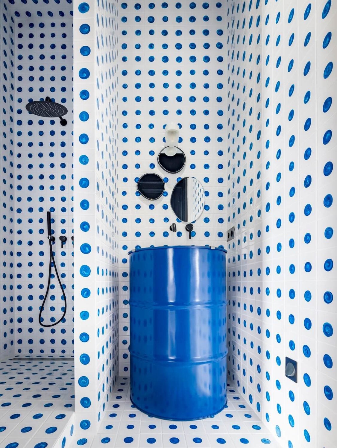 A Colorful Eclectic Apartment by Merci Paris 18 blue-dotted-tiled-shower-merci-paris-apartment-second-residence-nordroom