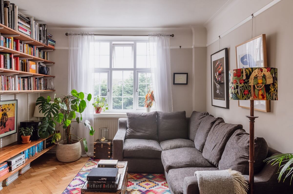 A Charming Two Bedroom Apartment in London 2 charming-living-room-colorful-rug-bookshelves-nordroom