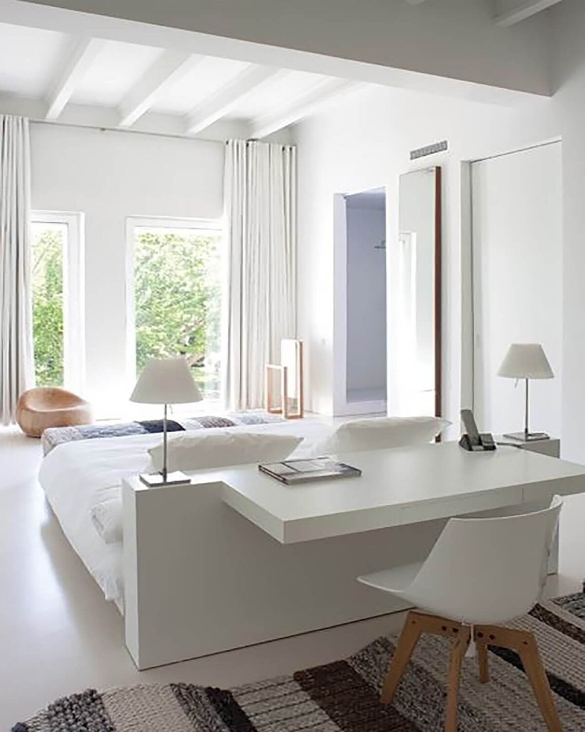 How To Design A Stylish Bedroom Home Office 21 desk-behind-bed-headboard-bedroom-office-nordroom