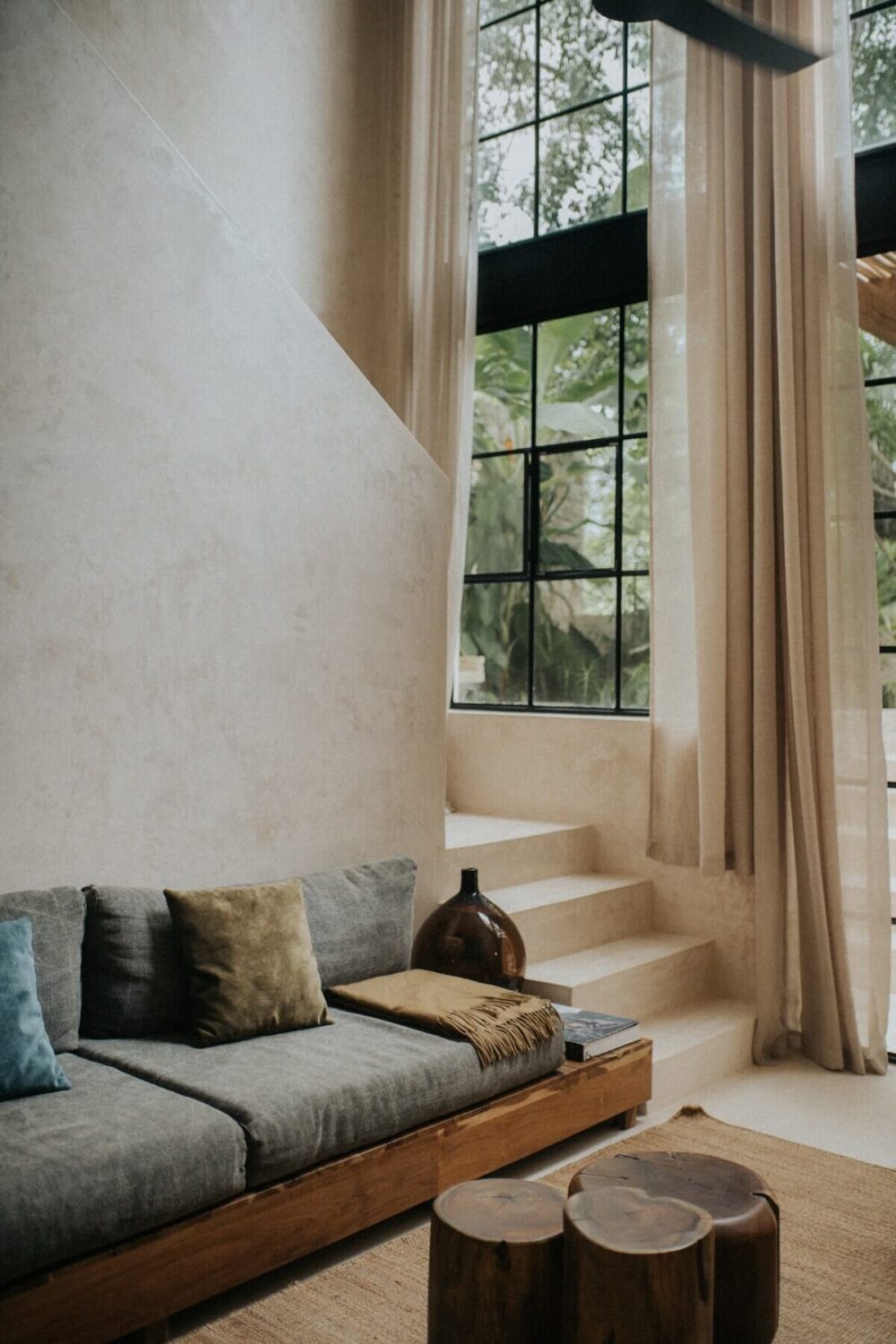 A Tulum Airbnb in an Architectural Building 3 double-height-living-room-steel-framed-windows-airbnb-nordroom