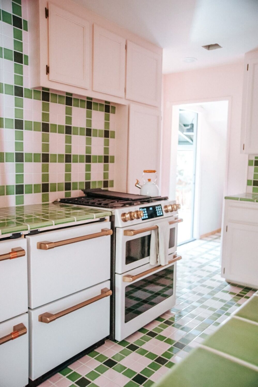 An Interior Designer's Colorful Airbnb Cabin 6 kitchen-green-tiles-airbnb-cabin-nordroom