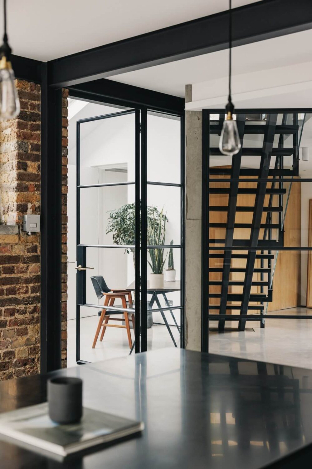 An Industrial Warehouse Conversion in London 16 kitchen-view-industrial-glass-doors-nordroom