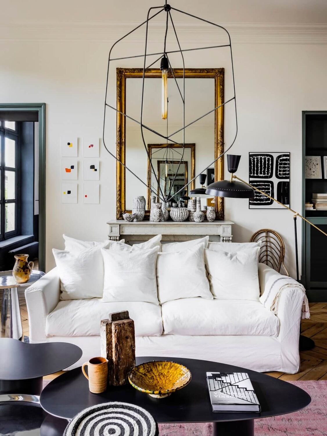 A Colorful Eclectic Apartment by Merci Paris 2 living-room-antique-mirror-paris-apartment-merci-nordroom
