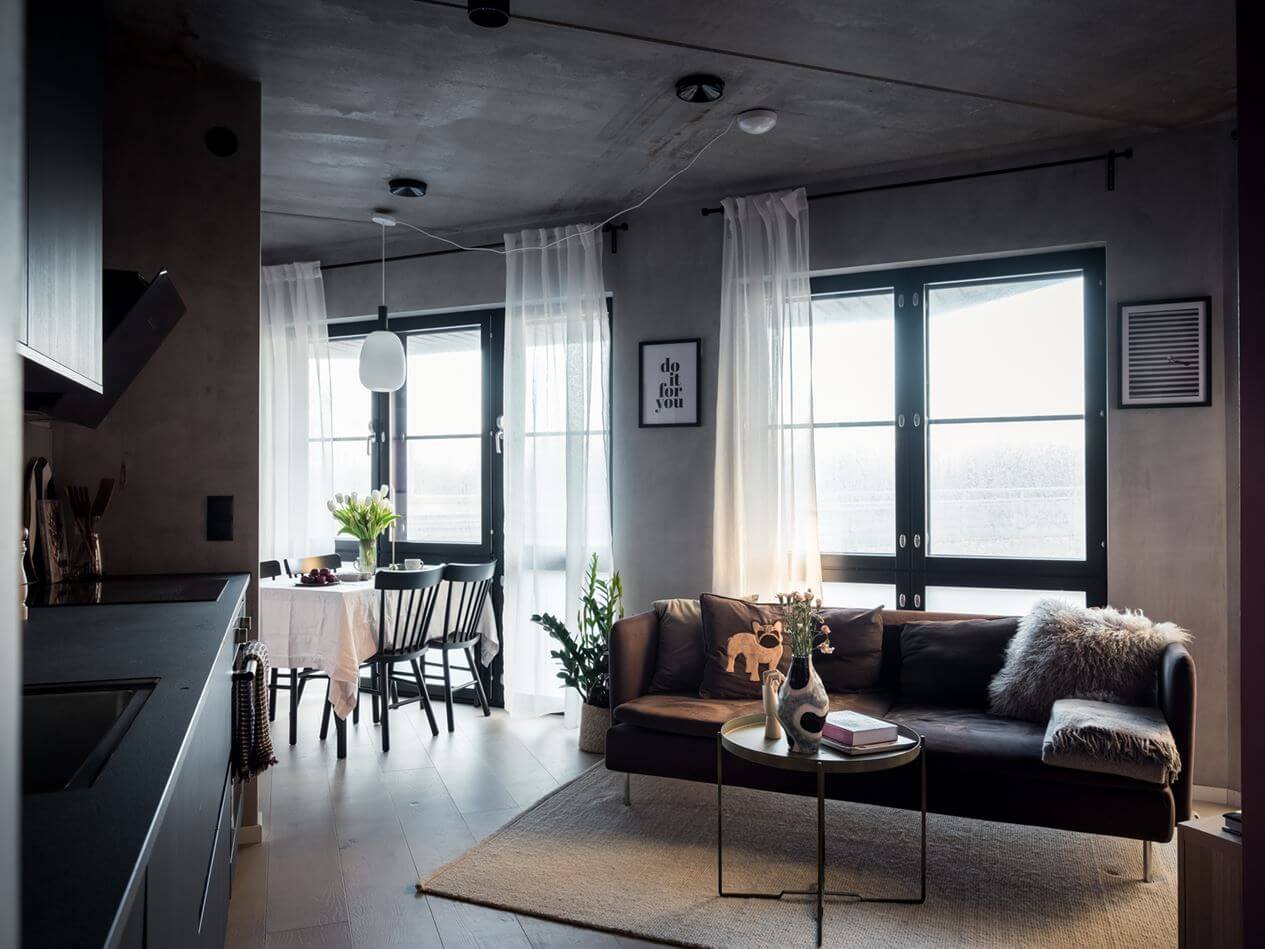 A Small Industrial Apartment with Pink Walls 6 living-room-oak-floor-concrete-walls-small-apartment-nordroom