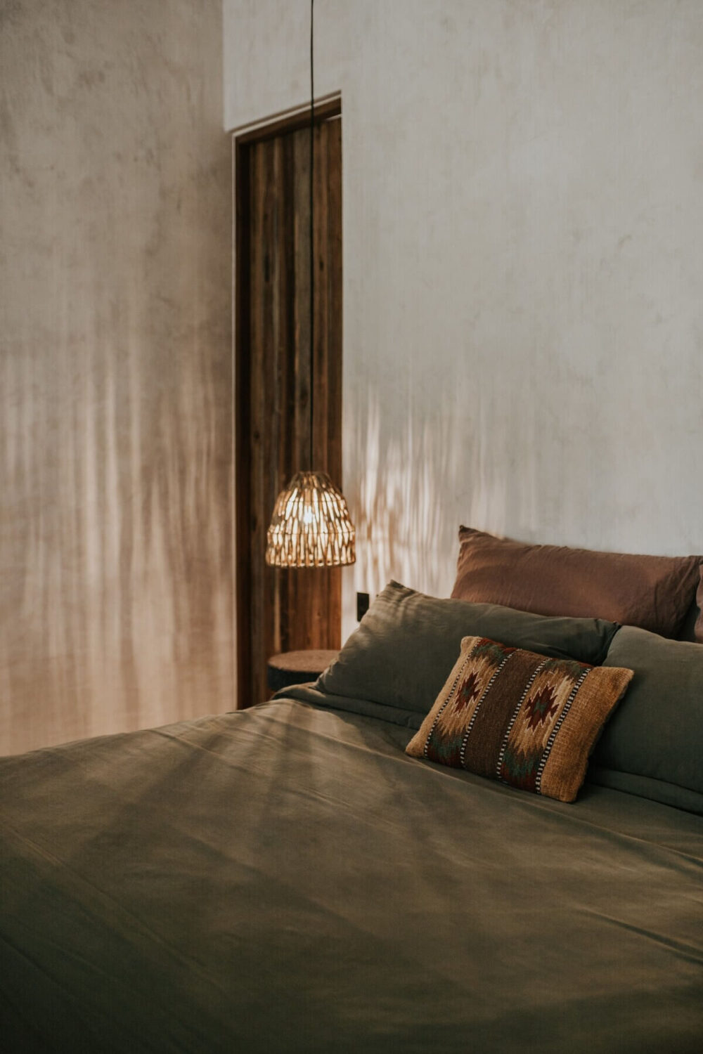 A Tulum Airbnb in an Architectural Building 21 natural-bedroom-green-bedding-nordroom
