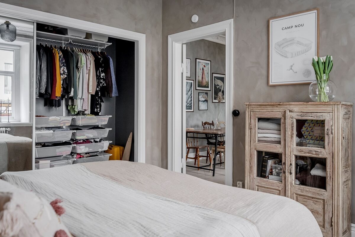 A Lovely Scandi Apartment with Original Features 12 neutral-boho-bedroom-walk-in-closet-nordroom