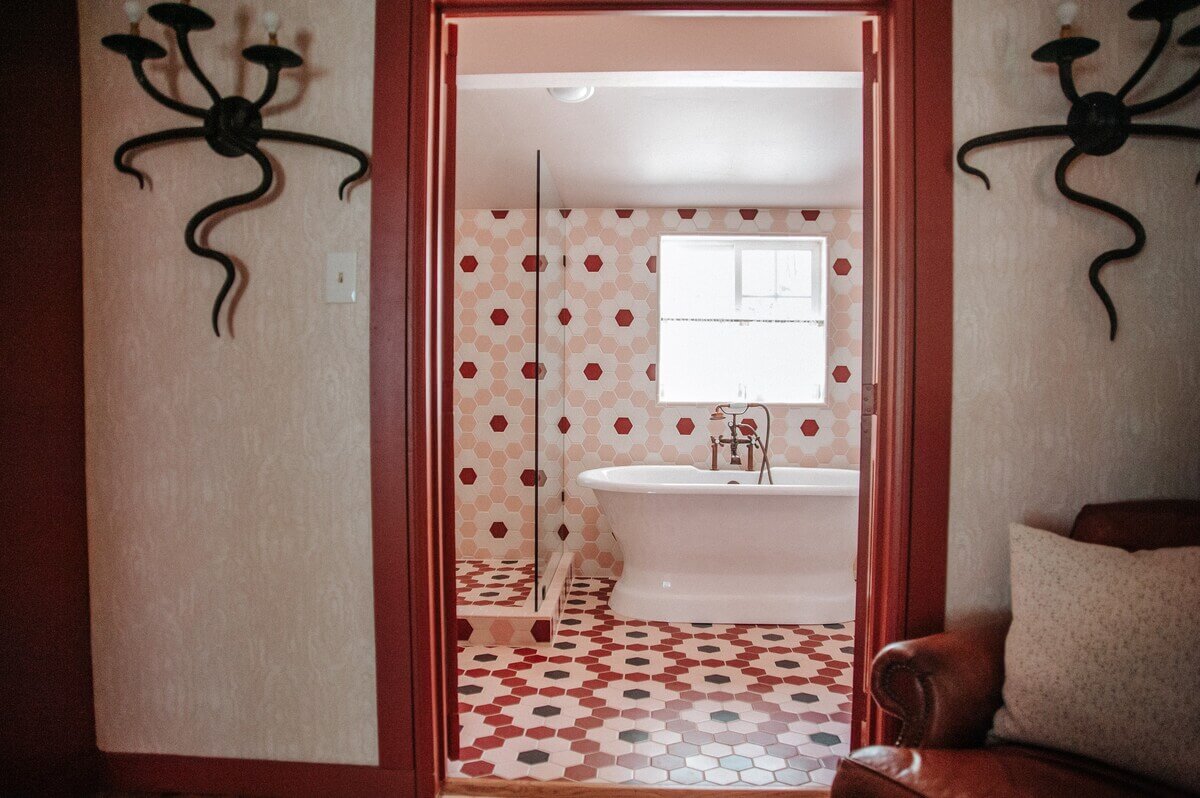 An Interior Designer's Colorful Airbnb Cabin 14 red-white-bathroom-airbnb-cabin-nordroom