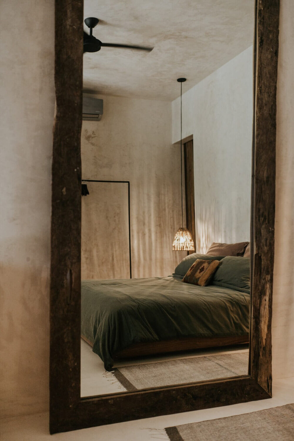 A Tulum Airbnb in an Architectural Building 20 rustic-natural-mirror-bedroom-nordroom
