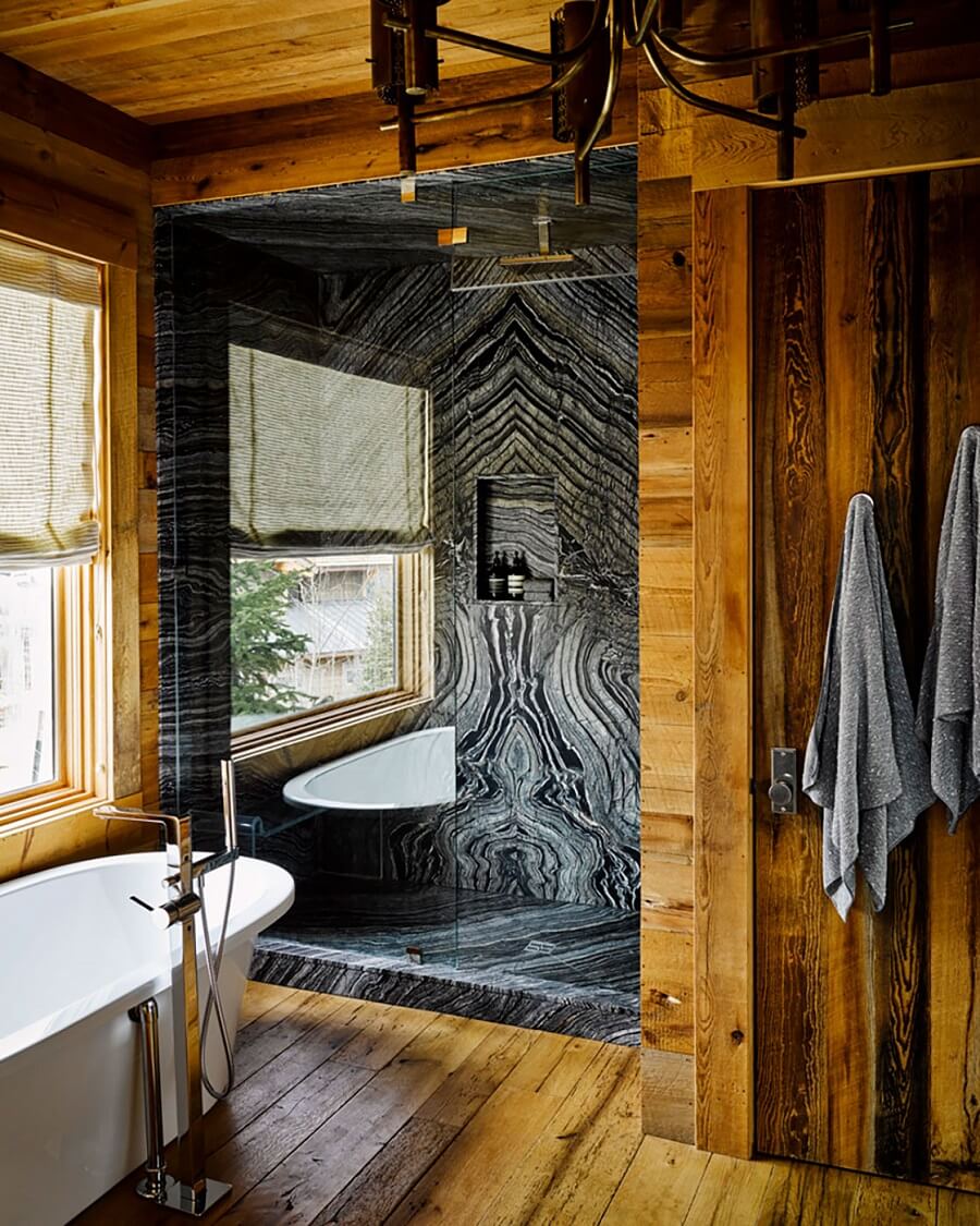 A Rustic Mountain Home in Big Sky, Montana 12 rustic-wooden-bathroom-freestanding-bath-walk-in-shower-nordroom