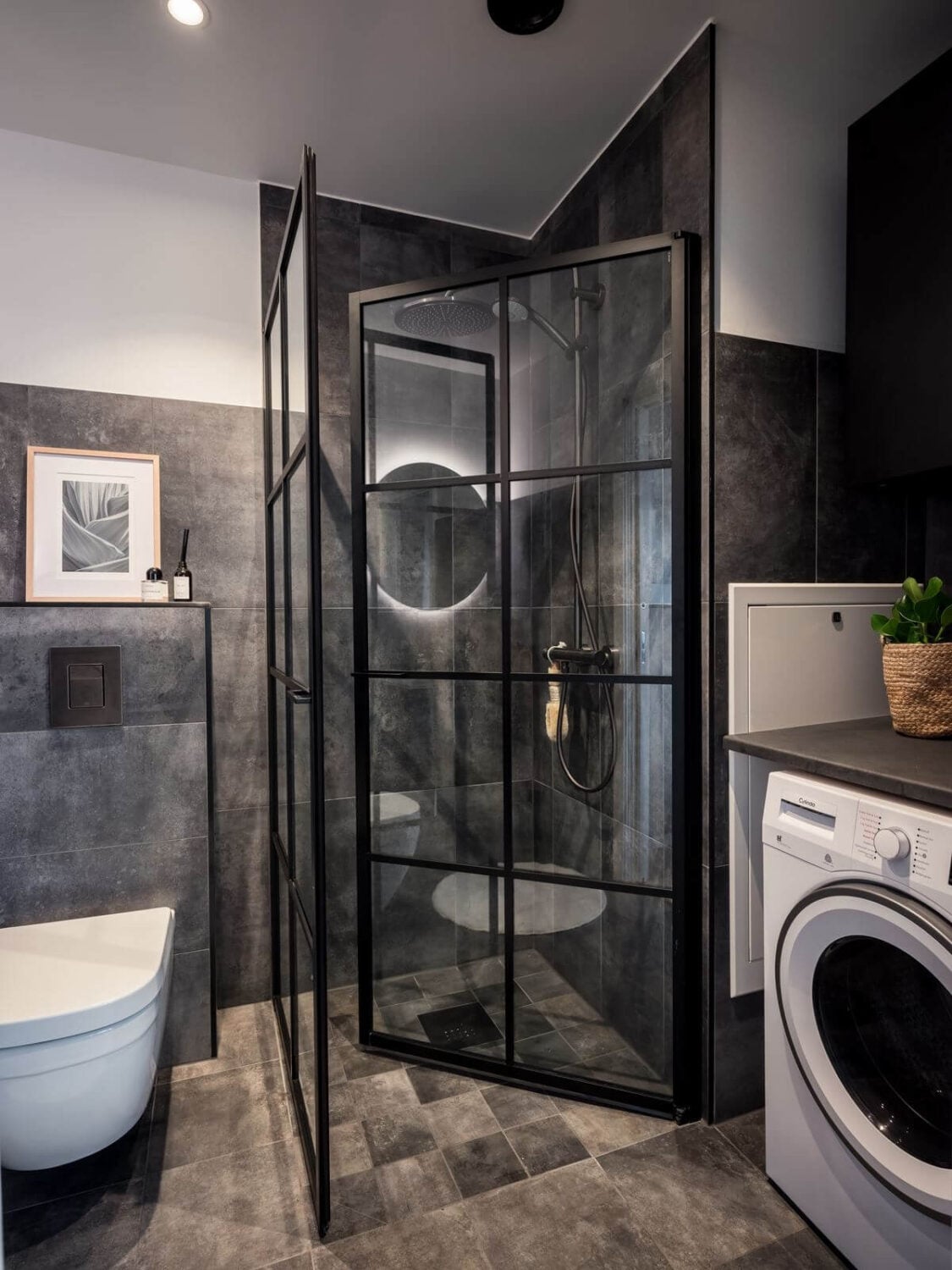 A Small Industrial Apartment with Pink Walls 11 small-industrial-bathroom-gray-tiles-nordroom