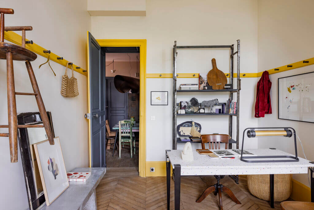 A Colorful Eclectic Apartment by Merci Paris 7 yellow-door-frames-workroom-merci-paris-apartment-nordroom