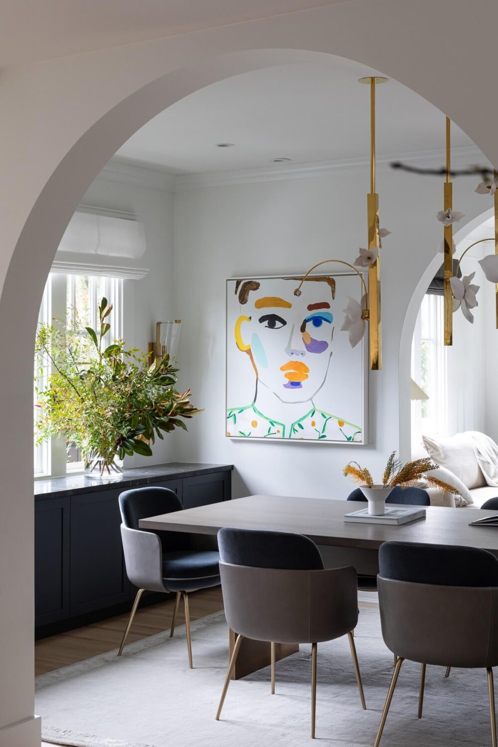 An Eclectic Elegant Home in Vancouver 9 arch-doorway-dining-room-artwork-nordroom