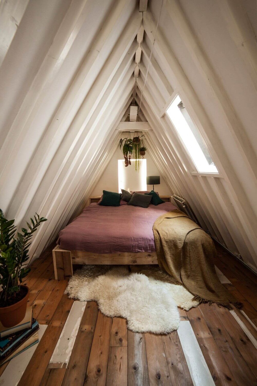 How To Decorate A Bedroom with A Slanted Ceiling 26 attic-bedroom-beams-plants-nordroom