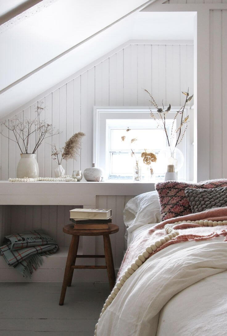 How To Decorate A Bedroom with A Slanted Ceiling 31 attic bedroom niche nordroom How To Decorate A Bedroom with A Slanted Ceiling
