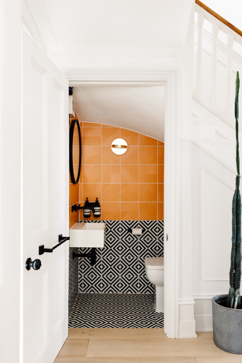 Inspiring Bathrooms With Geometric Tiles 17 bathroom-orange-geometric-tiles-london-home-nordroom