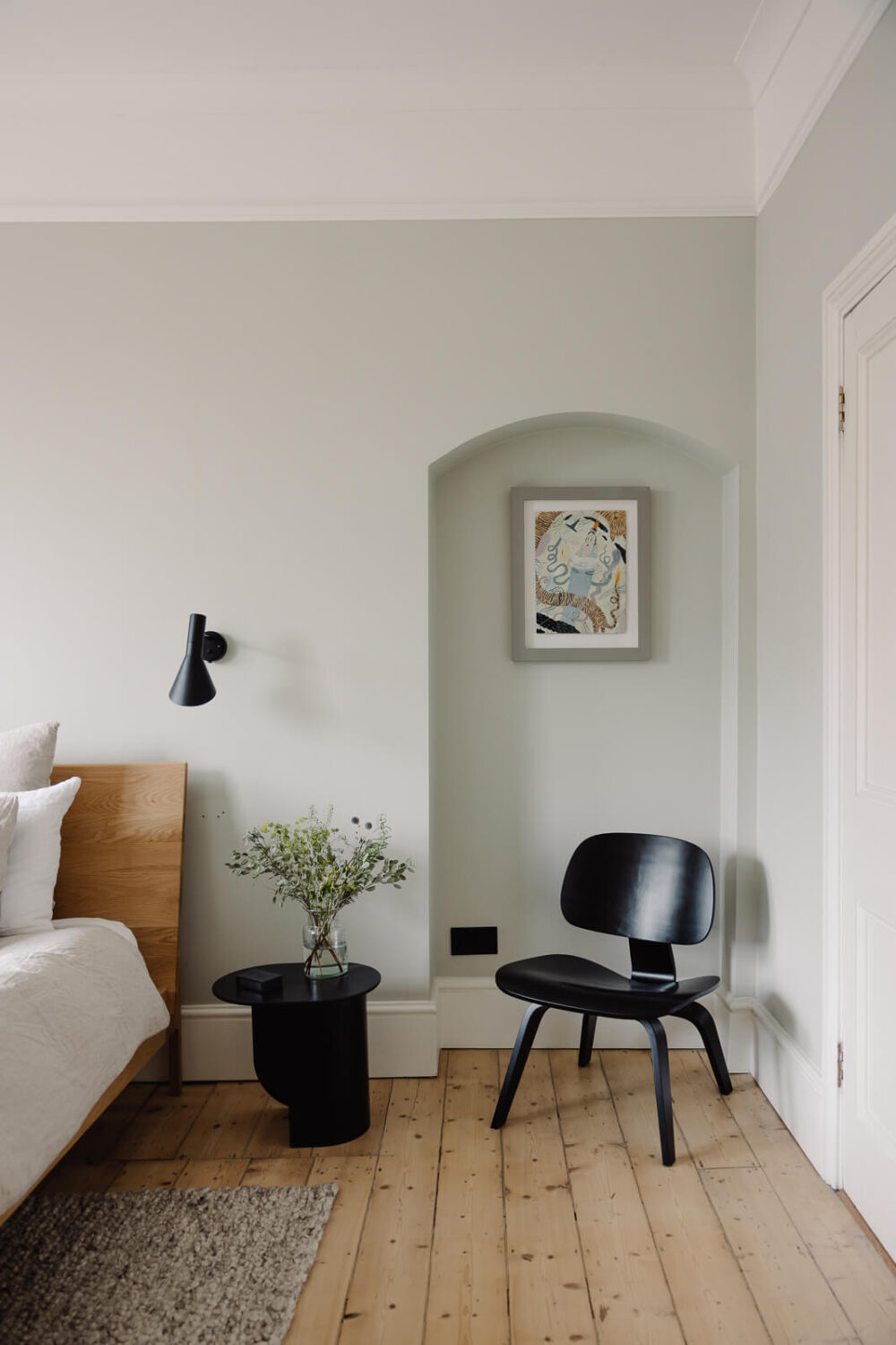 Oh Wonder’s Anthony and Josephine Sell Their Modern London Home 11 bedroom-wood-floor-niche-artwork-nordroom