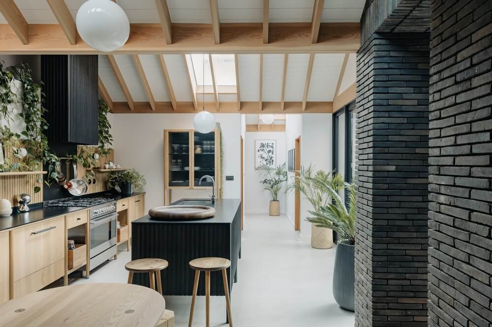 A Brick House in London Designed by Daniel Sanderson 12 black-brick-kitchen-exposed-beams-nordroom