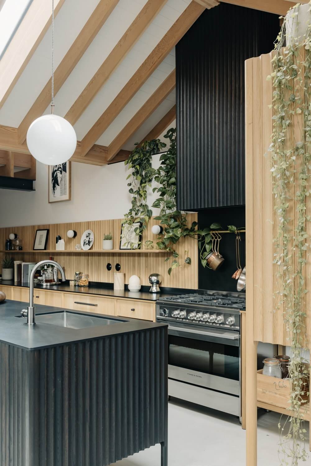 Beautiful Kitchens with Skylights That Add Light and Style 19 black-wood-kitchen-exposed-beams-daniel-sanderson-london-nordroom