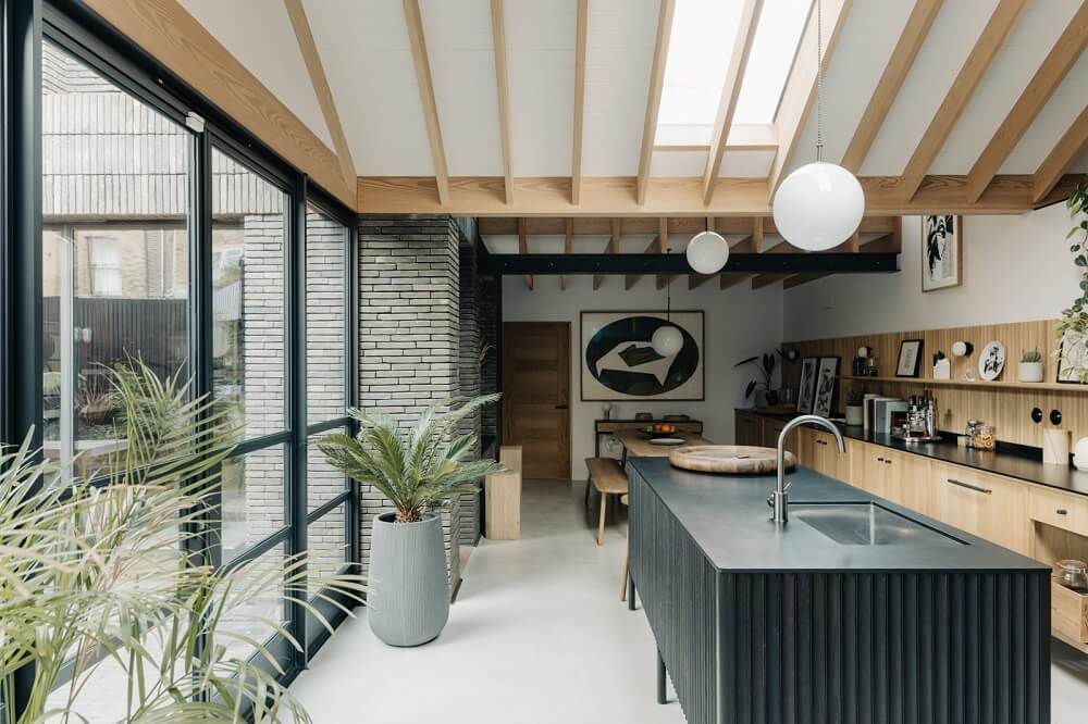 A Brick House in London Designed by Daniel Sanderson 9 black-wood-kitchen-exposed-beams-nordroom