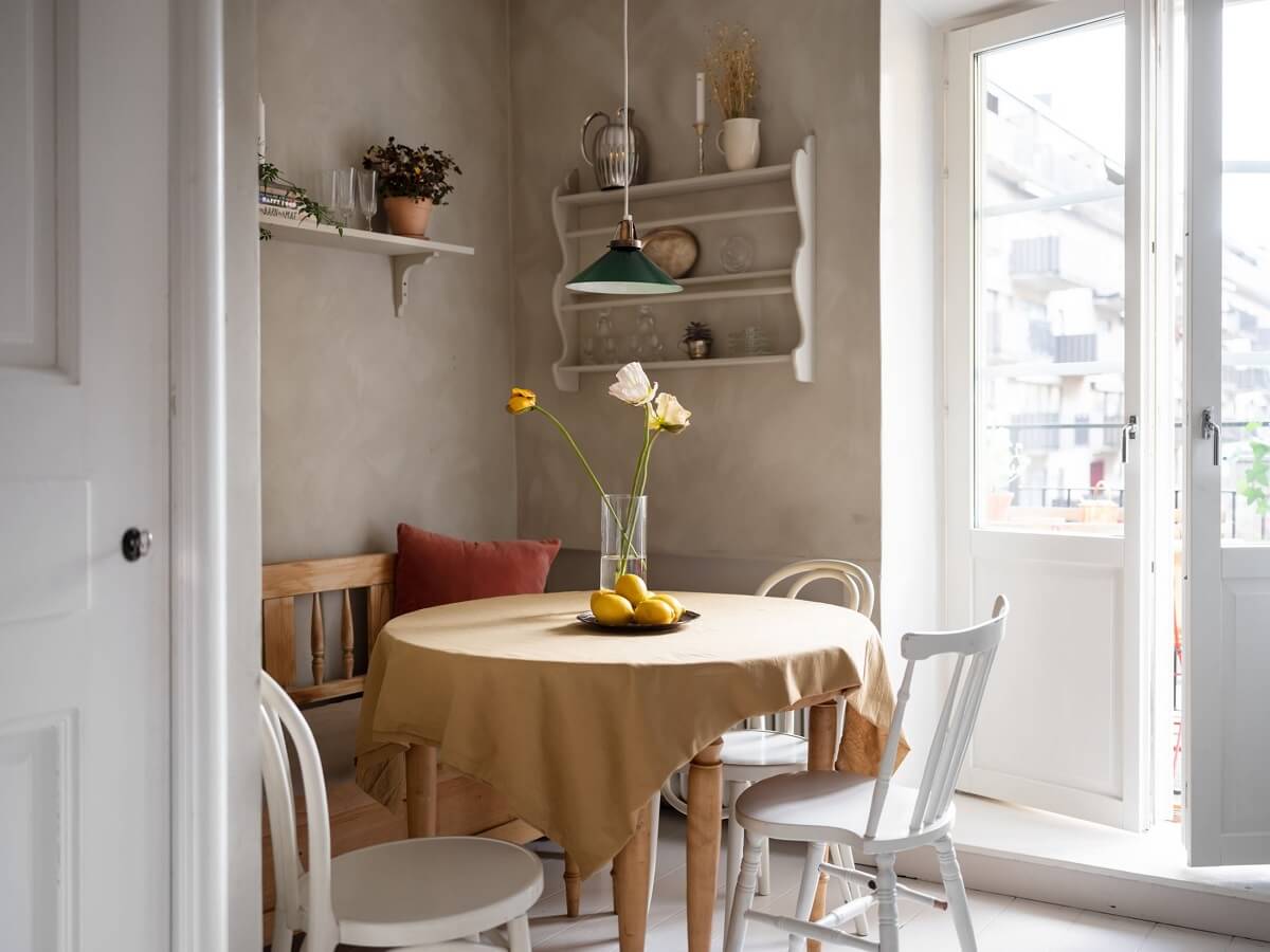 A Warm Soft Colored Home in Stockholm 11 breakfast-nook-light-grey-kitchen-nordroom