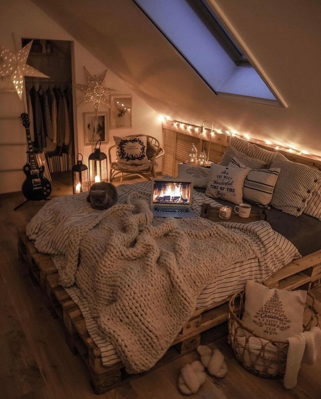 How To Decorate A Bedroom with A Slanted Ceiling 33 cozy-attic-bedroom-textiles-string-lights-nordroom