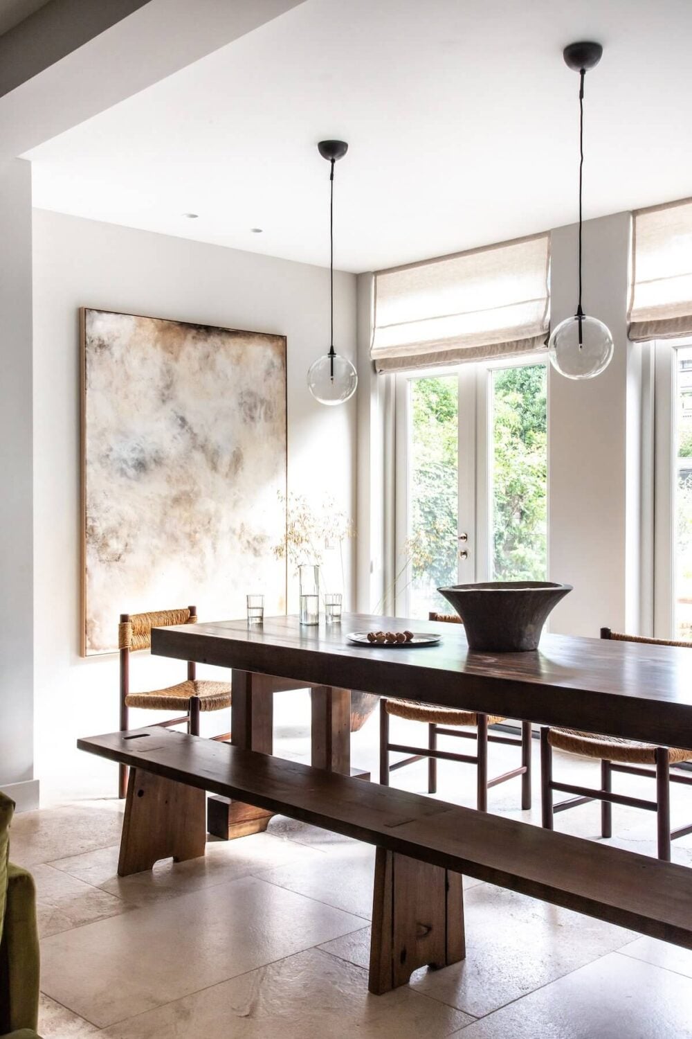 An Elegant Townhouse by Avenue Design Studio 2 dining-space-wooden-table-bench-limestone-floor-nordroom