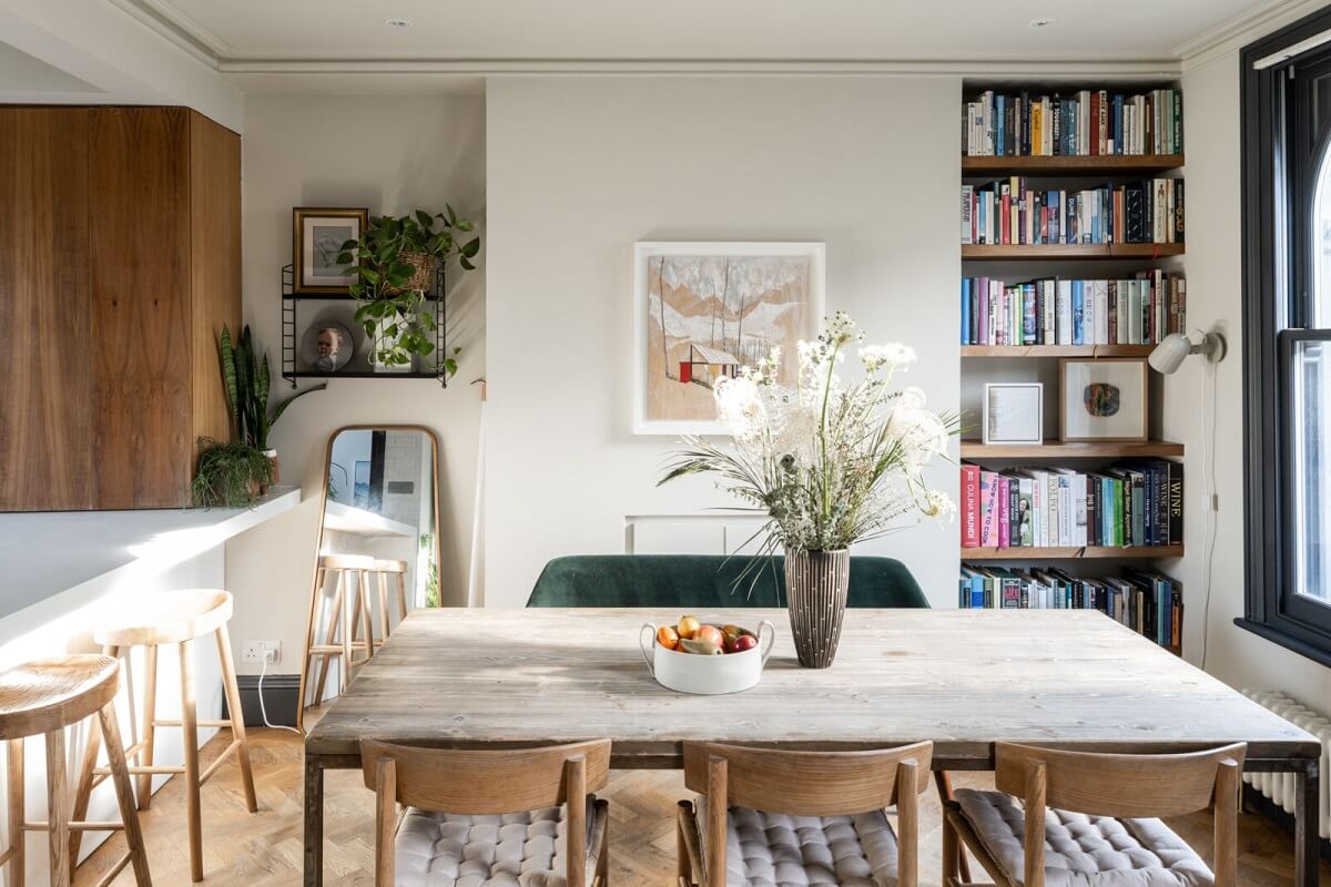 A London Family Home with Grey Accents 4 dining-table-bookshelves-velvet-bench-nordroom