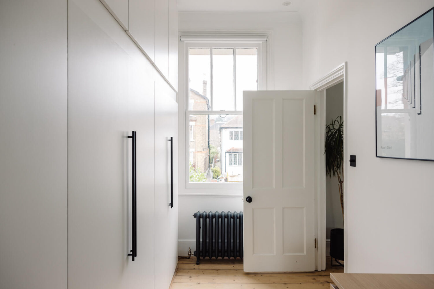 Oh Wonder’s Anthony and Josephine Sell Their Modern London Home 14 en-suite-closet-room-london-house-nordroom