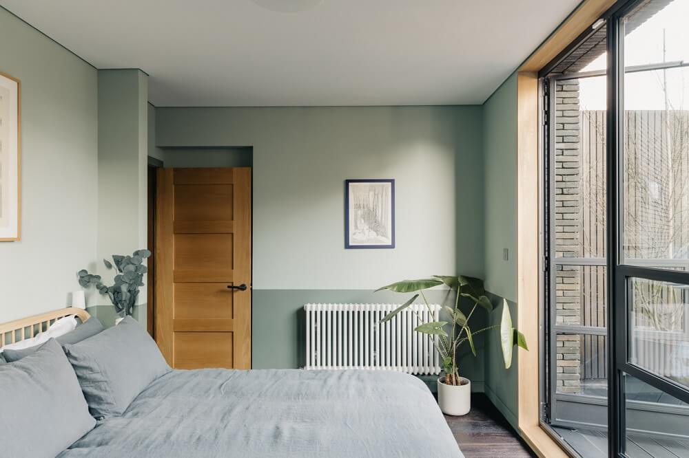 A Brick House in London Designed by Daniel Sanderson 17 green-master-bedroom-brickfields-house-london