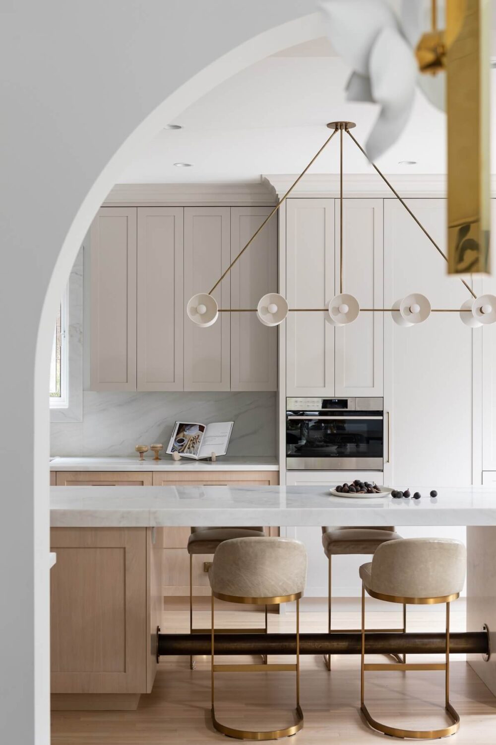 An Eclectic Elegant Home in Vancouver 12 light-kitchen-arches-breakfast-bar-gillian-segal-design-nordroom