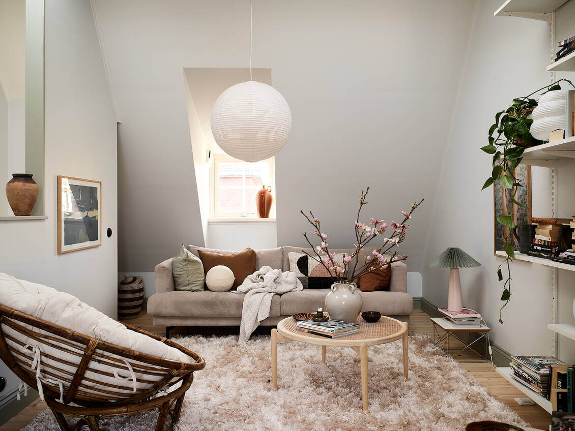 A Light Scandinavian Maisonette 2 light-sitting-room-slanted-ceiling-large-rug-nordroom