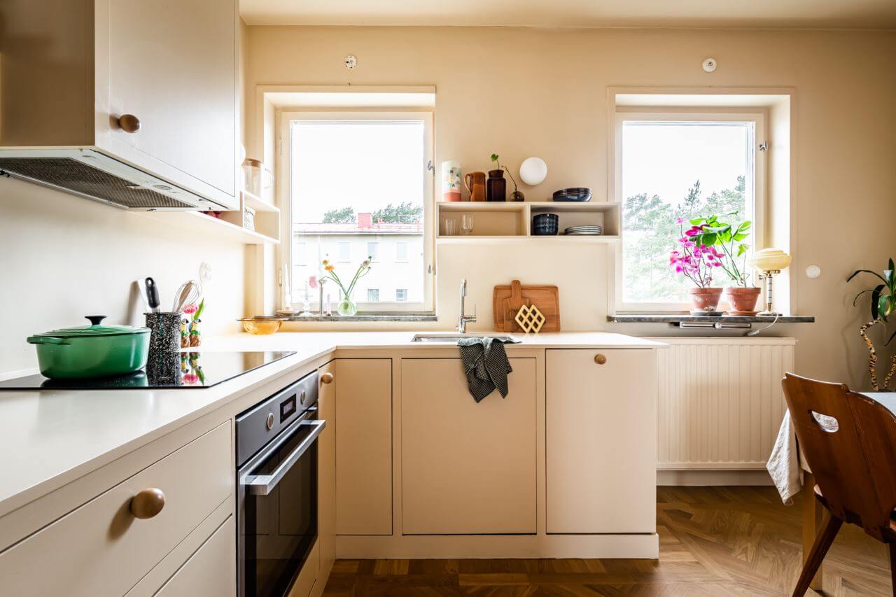 A Pink and Yellow Scandinavian Apartment 9 light-yellow-kitchen-nordroom