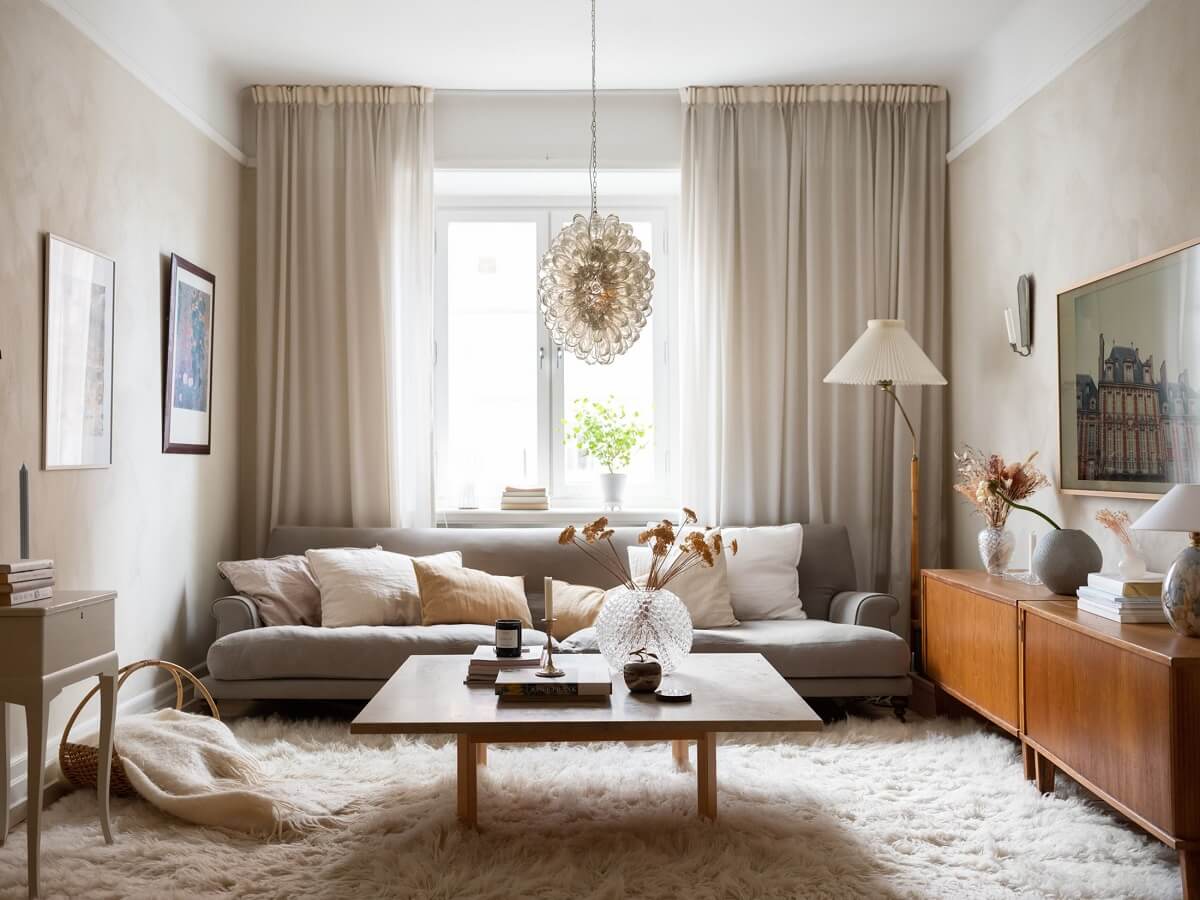 A Warm Soft Colored Home in Stockholm 2 living-room-large-rug-nordroom