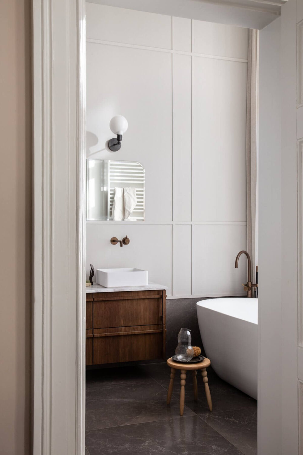 An Elegant Townhouse by Avenue Design Studio 25 master-bathroom-freestanding-bath-walnut-vanity-nordroom