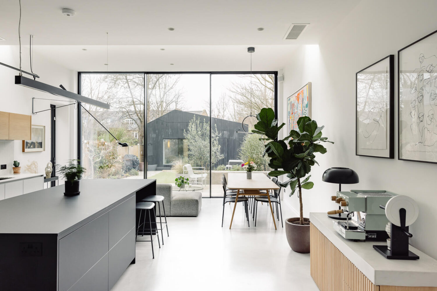 Oh Wonder’s Anthony and Josephine Sell Their Modern London Home 5 modern-bright-kitchen-glass-wall-london-home-nordroom
