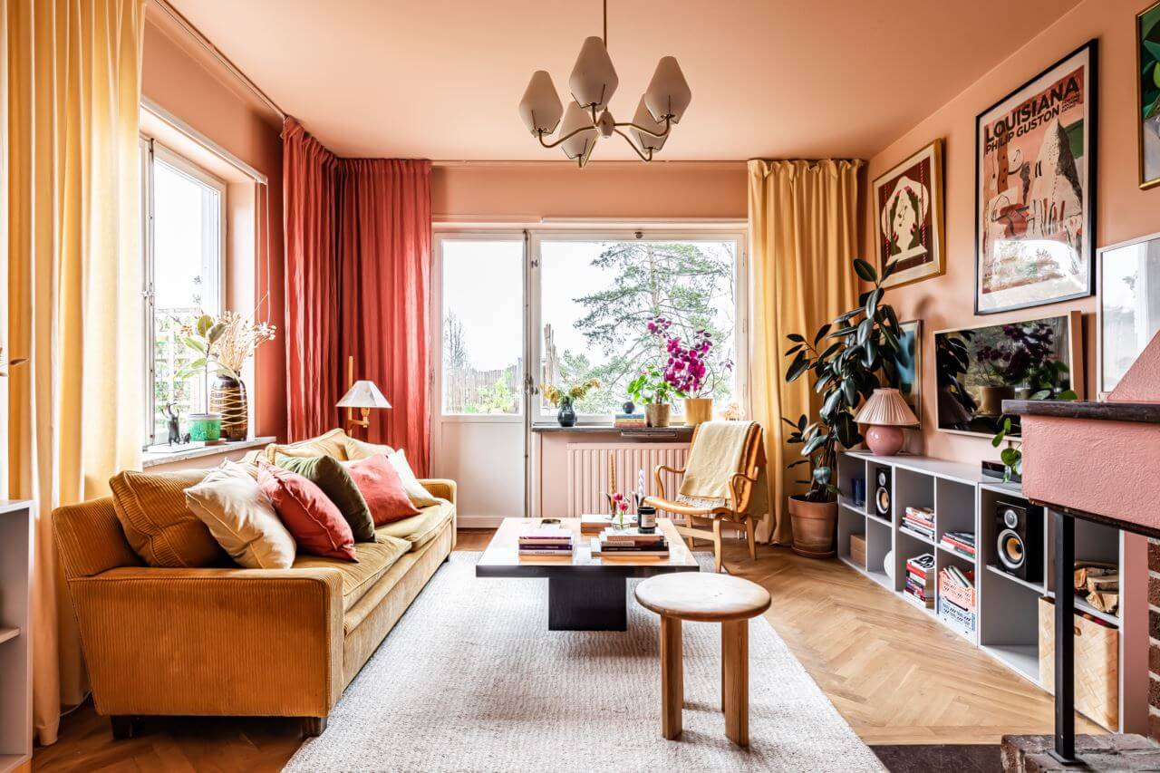 Pantone Color of the Year 2024 Home Decor Inspiration 39 ochre-sofa-pink-living-room-fireplace-nordroom