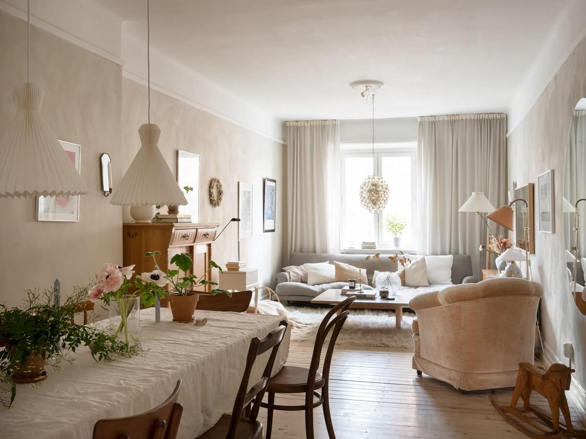 A Warm Soft Colored Home in Stockholm 1 scandinavian-living-room-vintage-decor-dining-table-nordroom