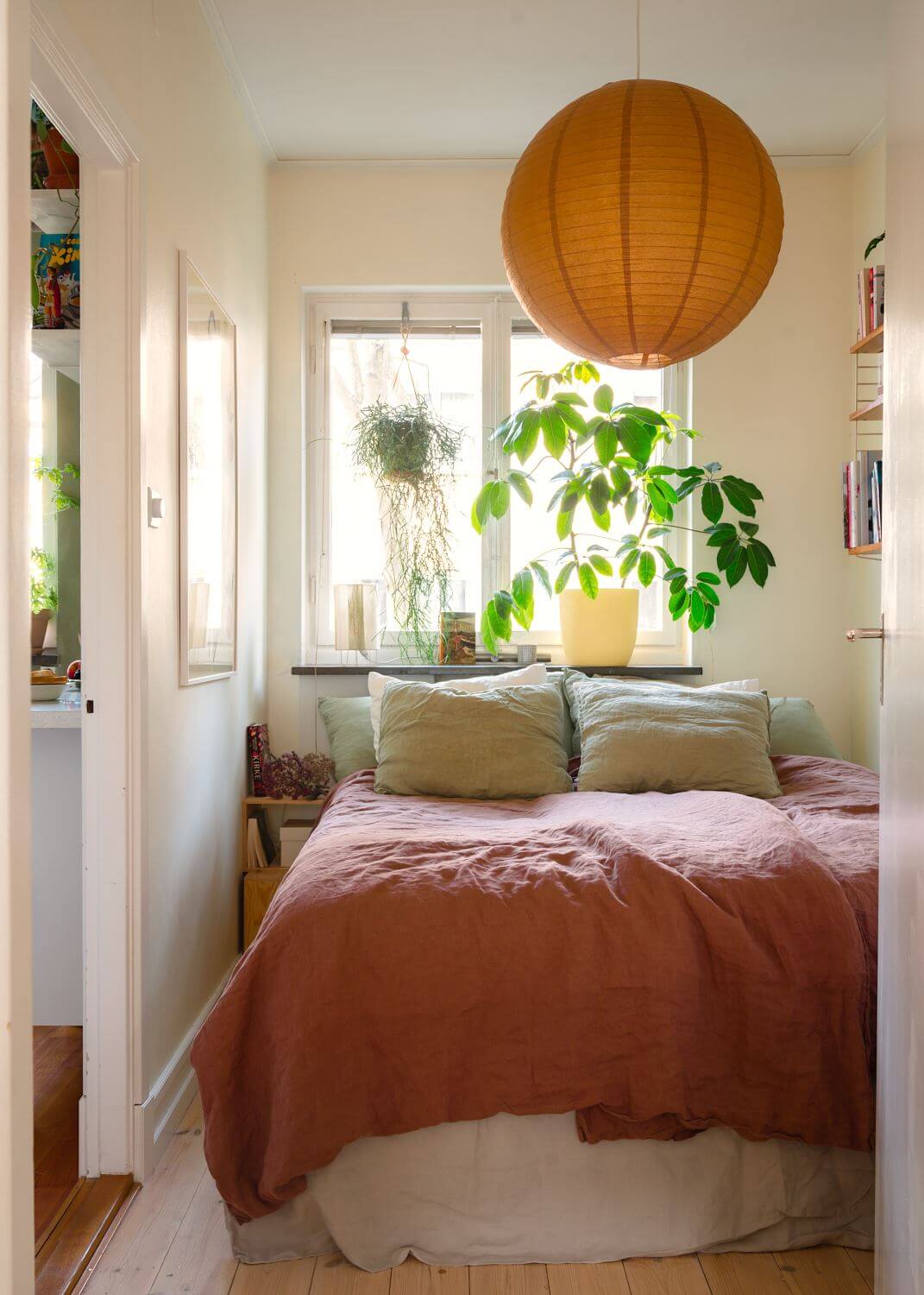 A Small Light Apartment with Plants 8 tiny-bedroom-pale-yellow-walls-nordroom