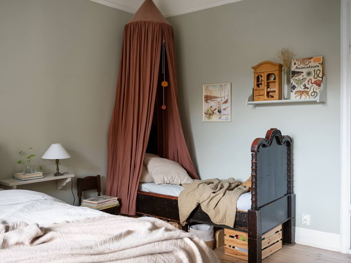 A Warm Soft Colored Home in Stockholm 15 vintage-kids-bed-canopy-bedroom-nordroom