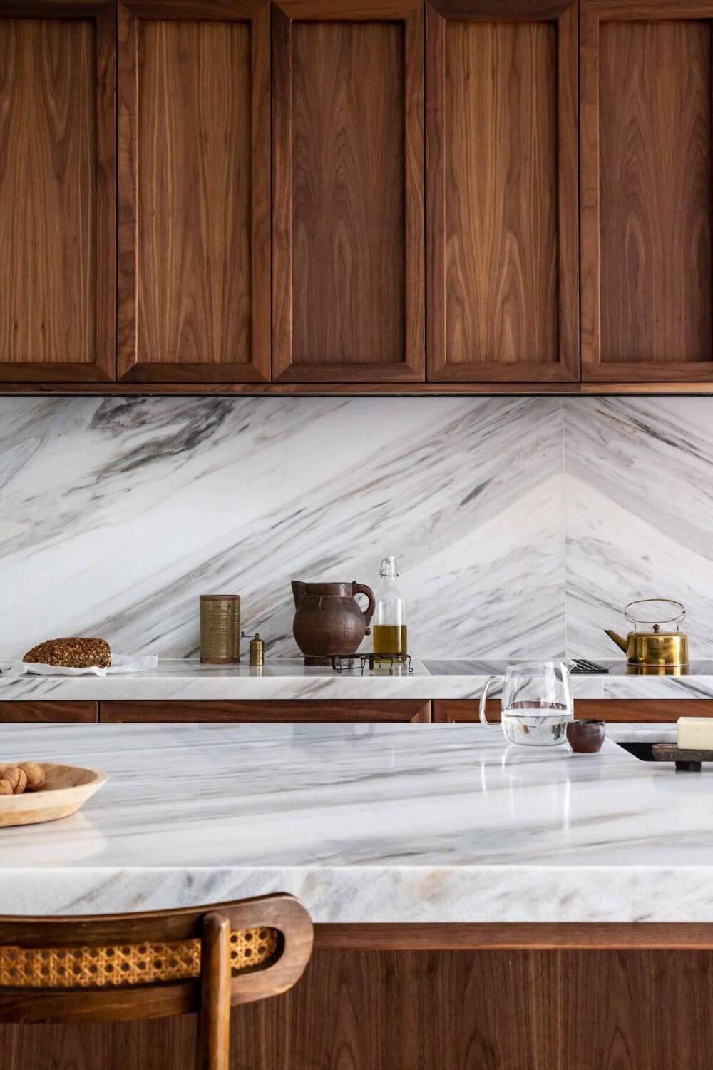 An Elegant Townhouse by Avenue Design Studio 6 walnut-kitchen-cabinet-marble-countertop-shaker-style-nordroom