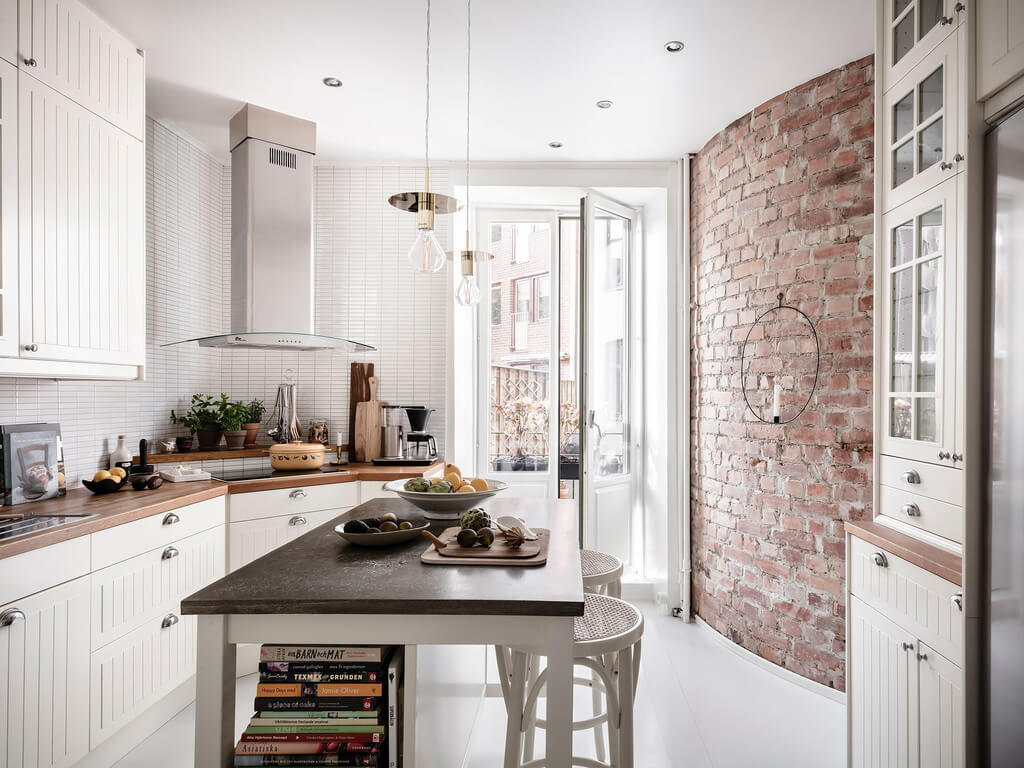 A White Nordic Apartment 11 white-kitchen-exposed-brick-wall-nordroom